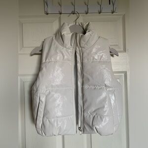 White puffy vest